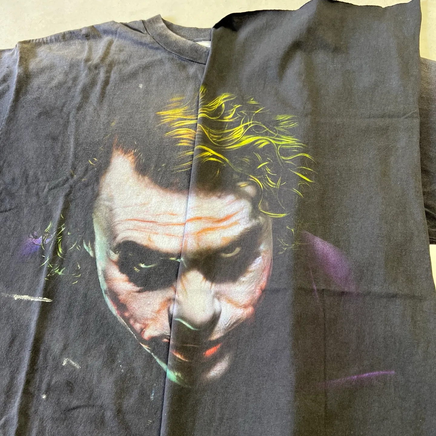 ⚠️This season's most important Batman and Joker IP collaboration SAINT Mxxxxxx x The Dark Knight BTM SS TEE /JOKER/BLACK Dark Knight Batman co-branded Joker character TEE Washed black S-XL Assute ready-to-wear dyeing, faded, re-washed and distressed, authentic proofing, custom-woven correct main mark, washed mark, difference between pictures and production, top-notch printing technology, God restores every pore of the Joker's headshot